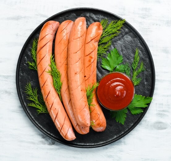application hot dogs on plate