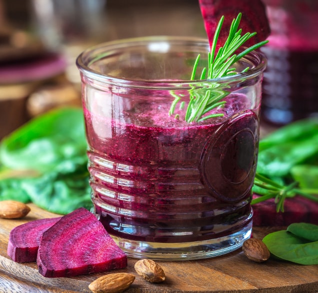concentrates-beet glass of bright purple beet juice